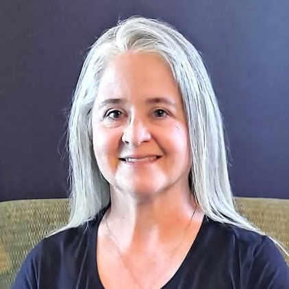 Professional headshot of Mary